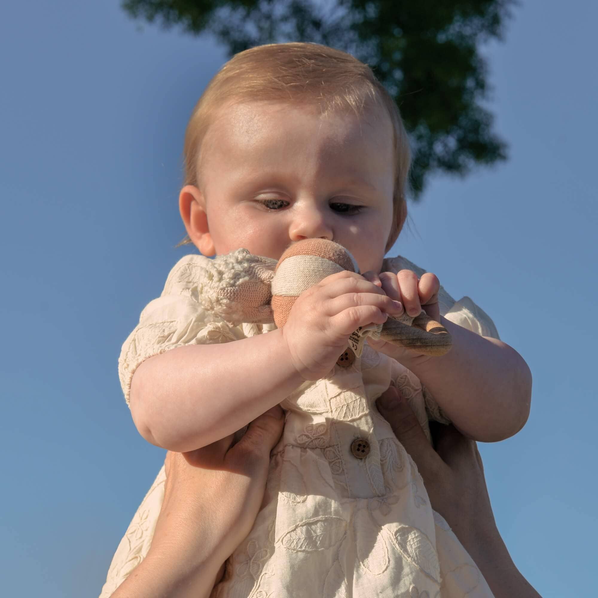Baby Bello brand imagery: Soft Scandinavian baby essentials and nursery accessories in timeless, muted tones.
